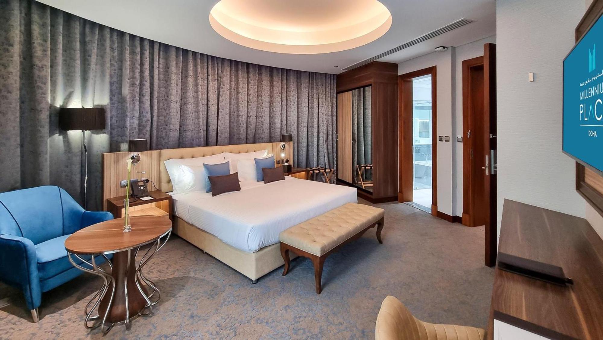 Millennium Place דוחה מראה חיצוני תמונה A bedroom at the hotel